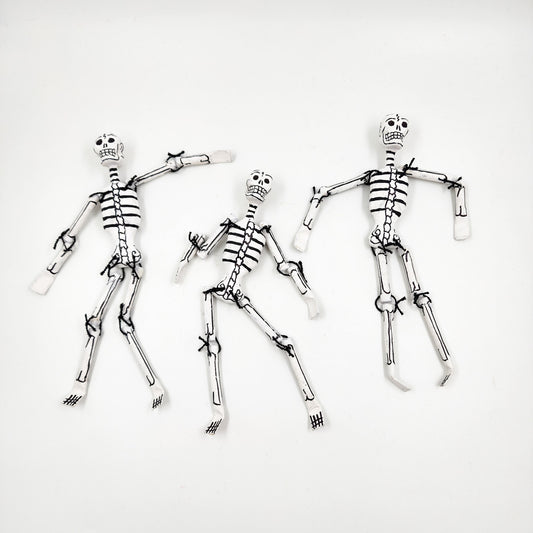 Jointed papier-mâché skeletons