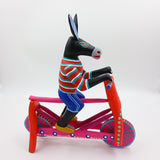 Alebrije burro en bicicleta - San Martín Tilcajete