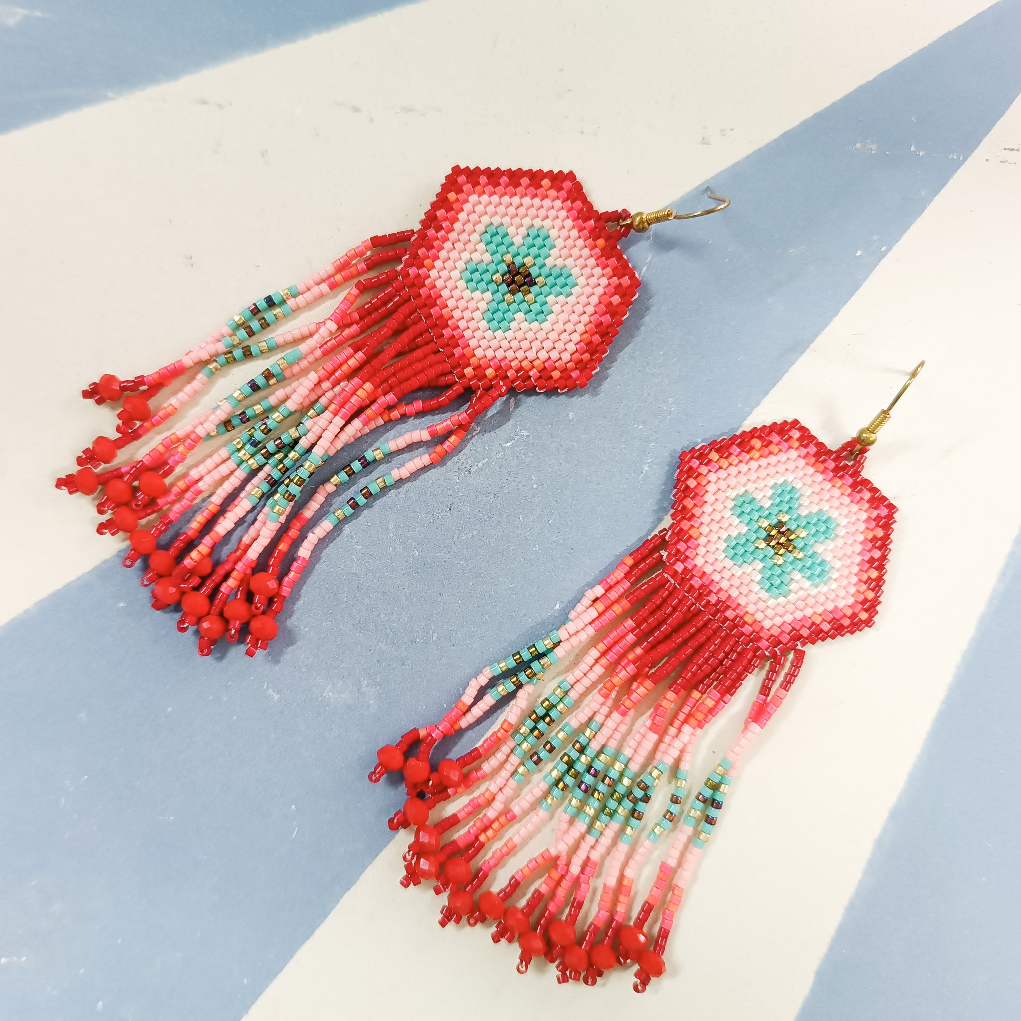 Aretes huichol mandala flor