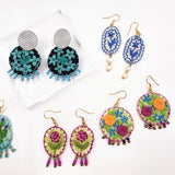 Aretes bordados a mano