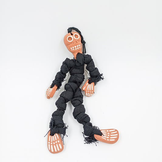 Calaquita en barro y cuerpo de paliacate