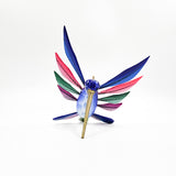 Colibrí azul en madera de copal