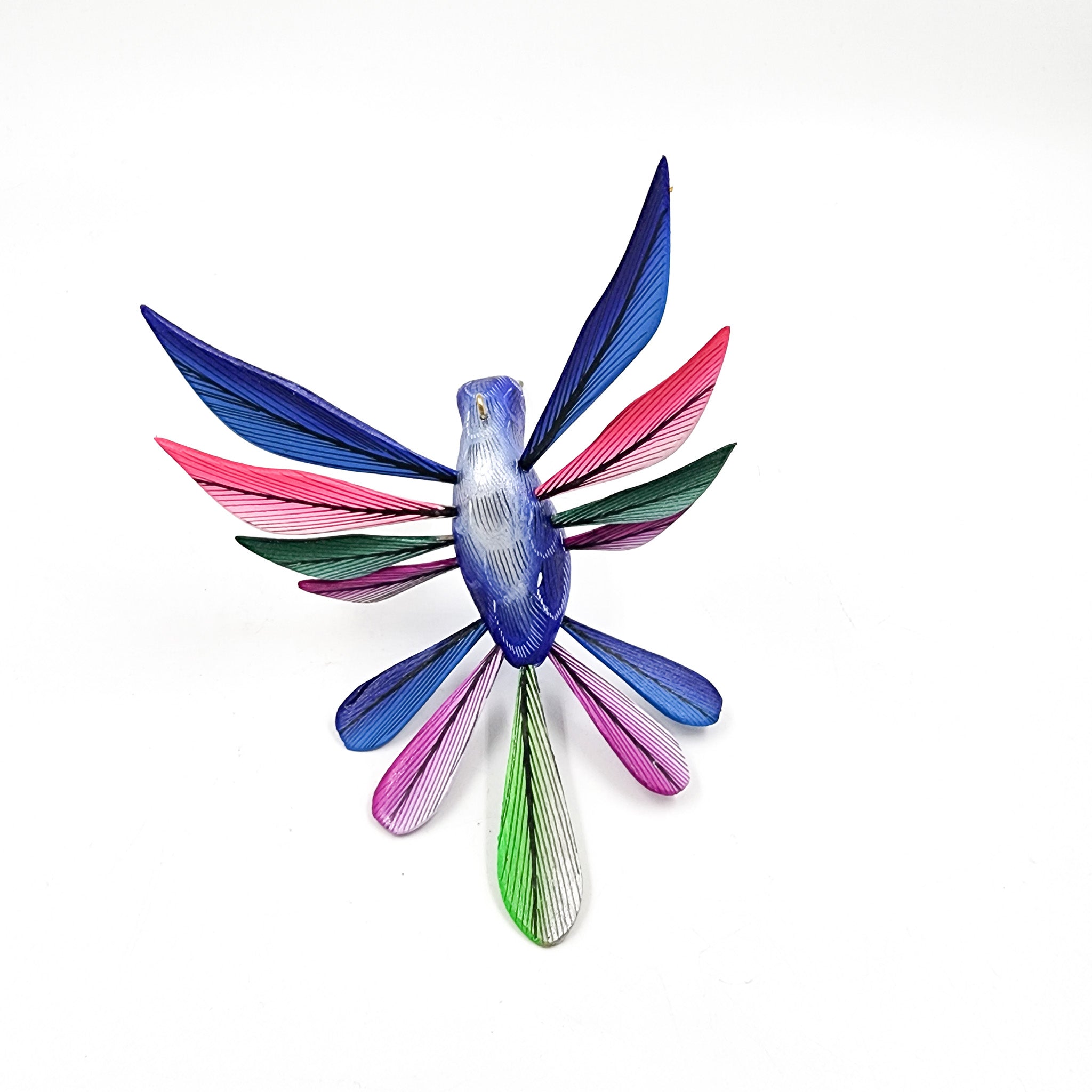 Colibrí azul en madera de copal