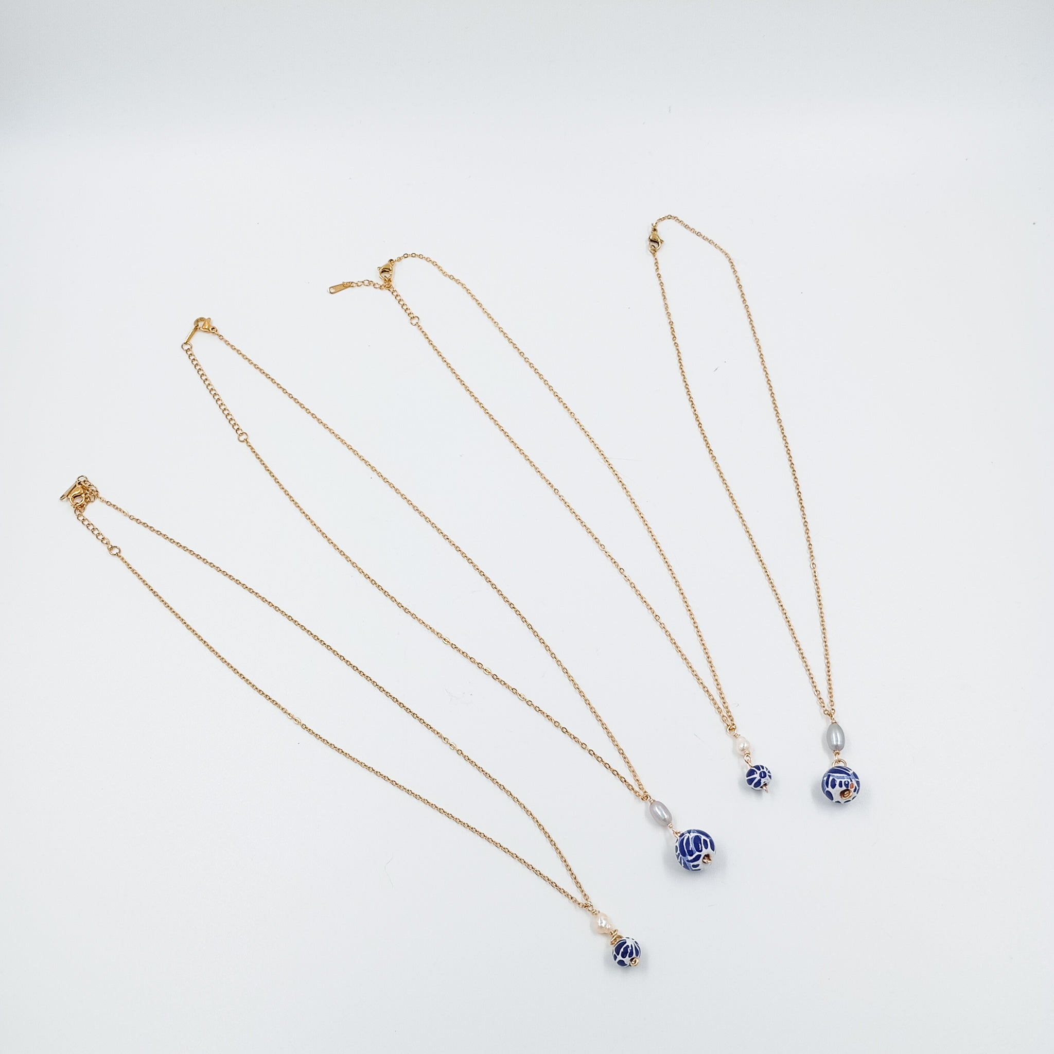 Collar Talavera y perla de río con cadena chapa de oro 14k
