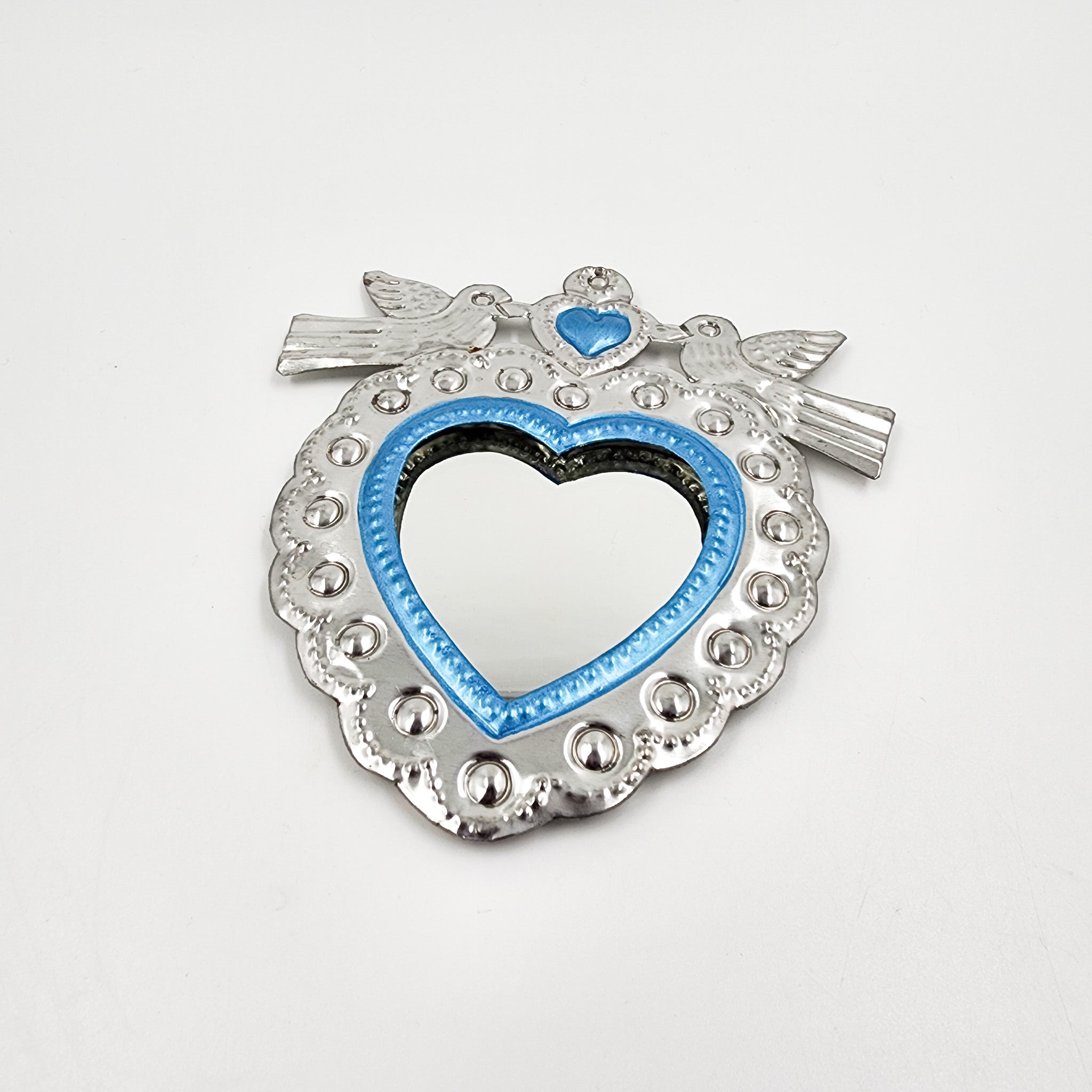 Mirror heart with embossed tin doves