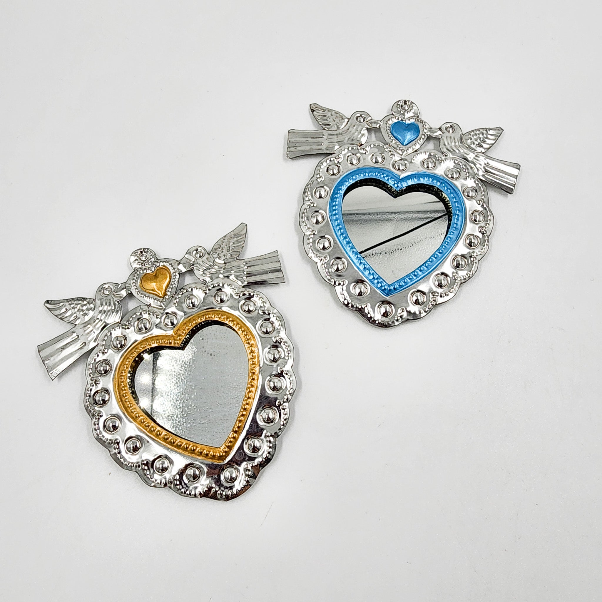 Mirror heart with embossed tin doves
