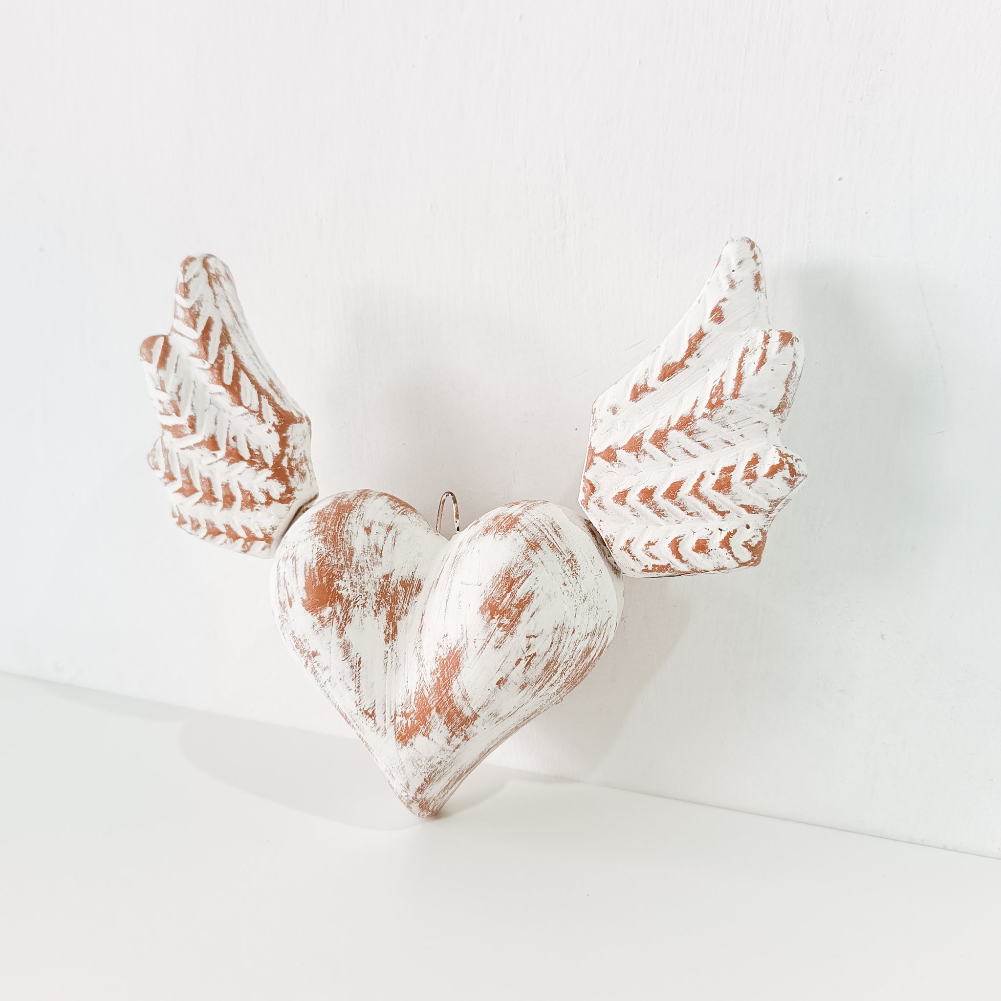 Clay heart with wings