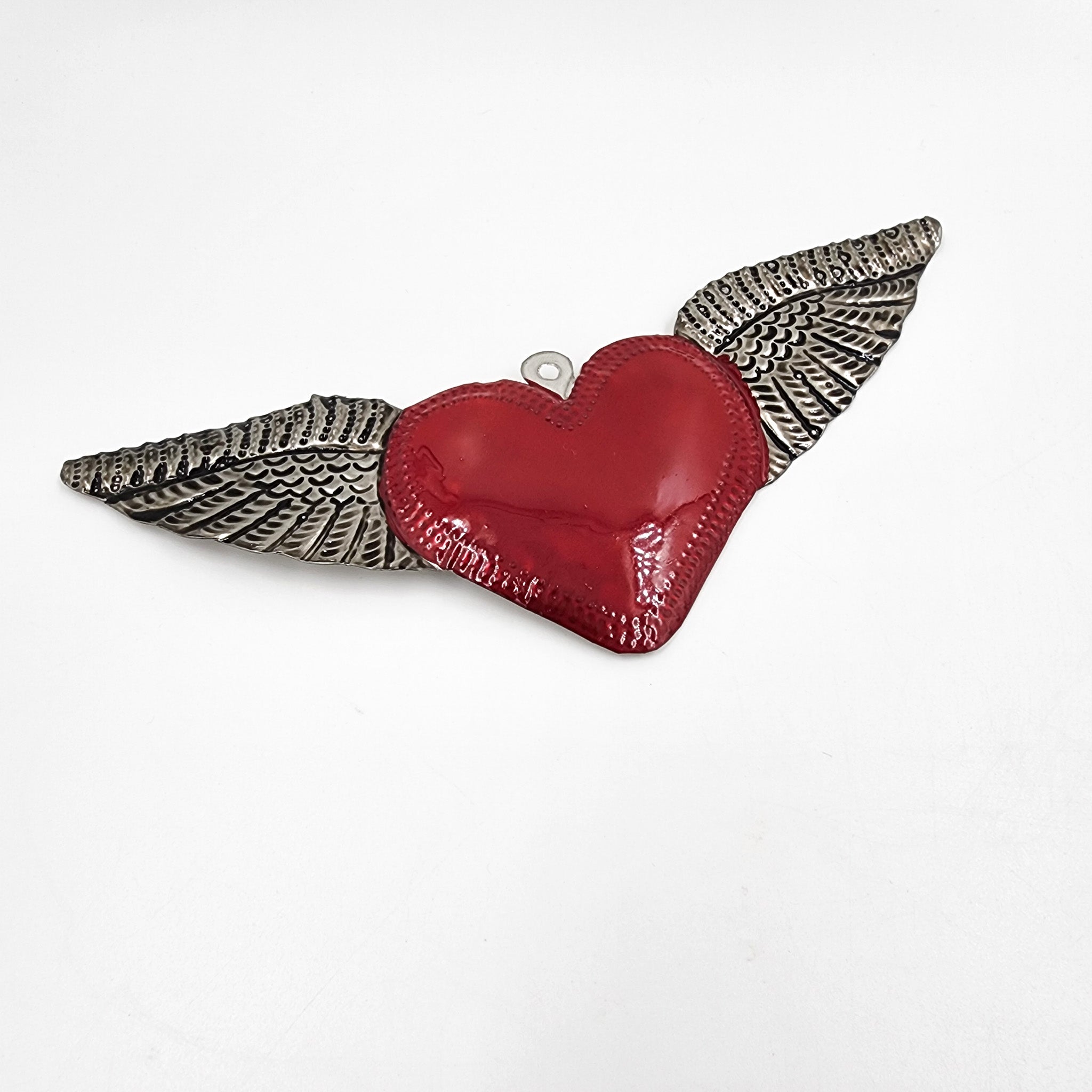 Heart with embossed tin wings