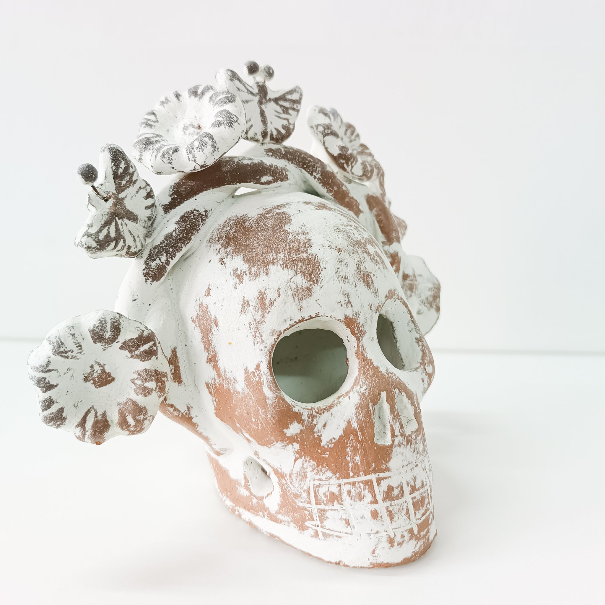 Calaverita skull in clay