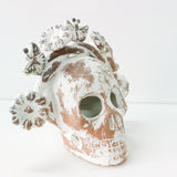 Calaverita skull in clay