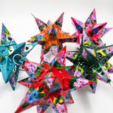 Estrella de hojalata decorada