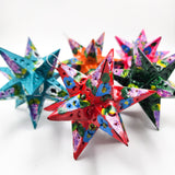 Estrella de hojalata decorada