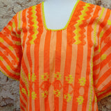 Huipil artesanal de Oaxaca - naranja y amarillo neón con estrellas