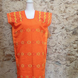 Huipil artesanal de Oaxaca - naranja neón con estrellas amarillas
