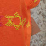 Huipil artesanal de Oaxaca - naranja neón con estrellas amarillas