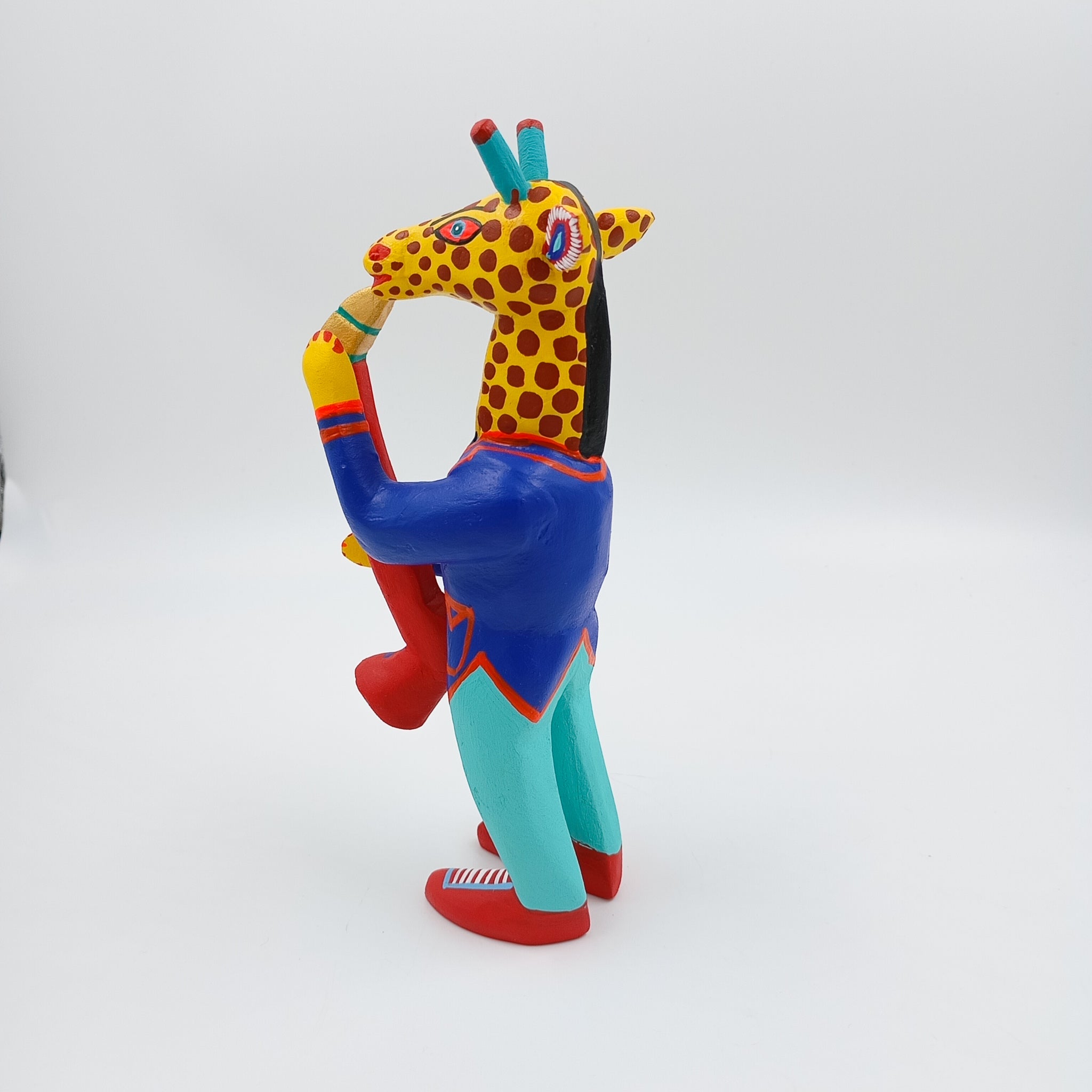 Alebrije jirafa con saxofón - San Martín Tilcajete