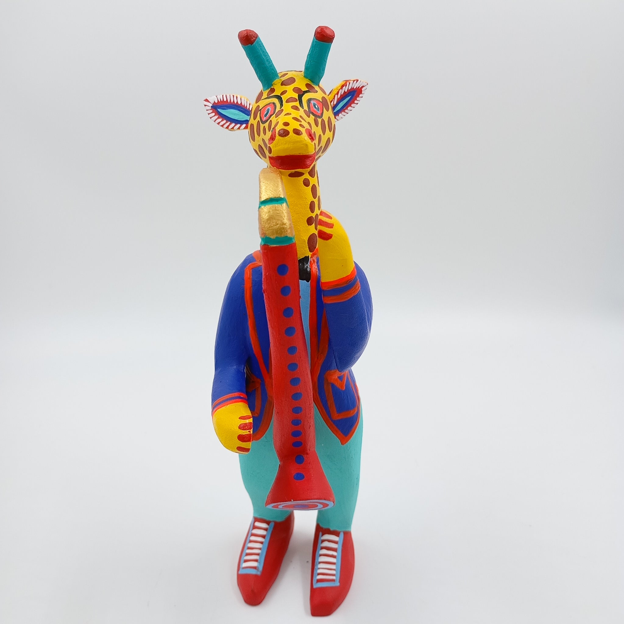 Alebrije jirafa con saxofón - San Martín Tilcajete