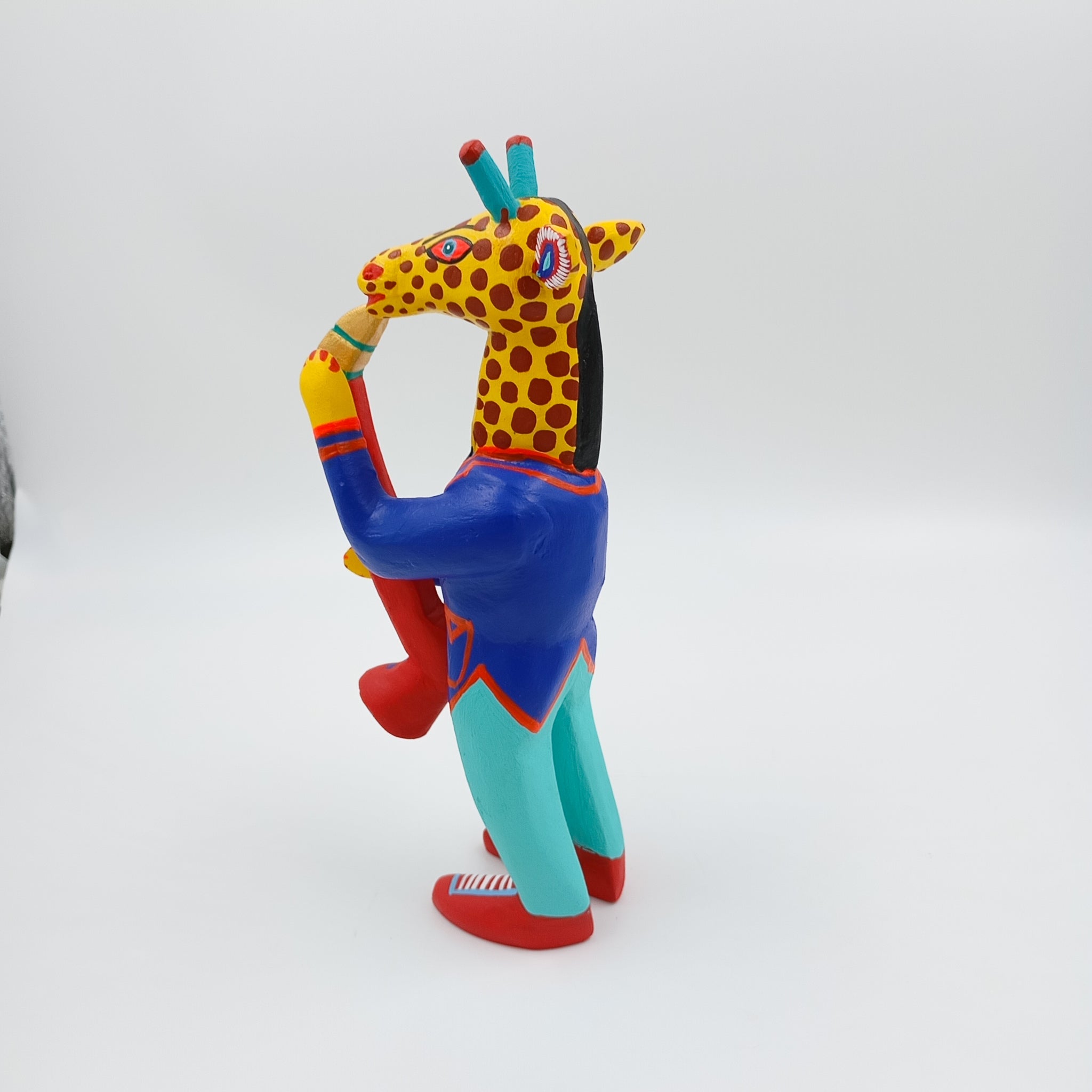 Alebrije jirafa con saxofón - San Martín Tilcajete