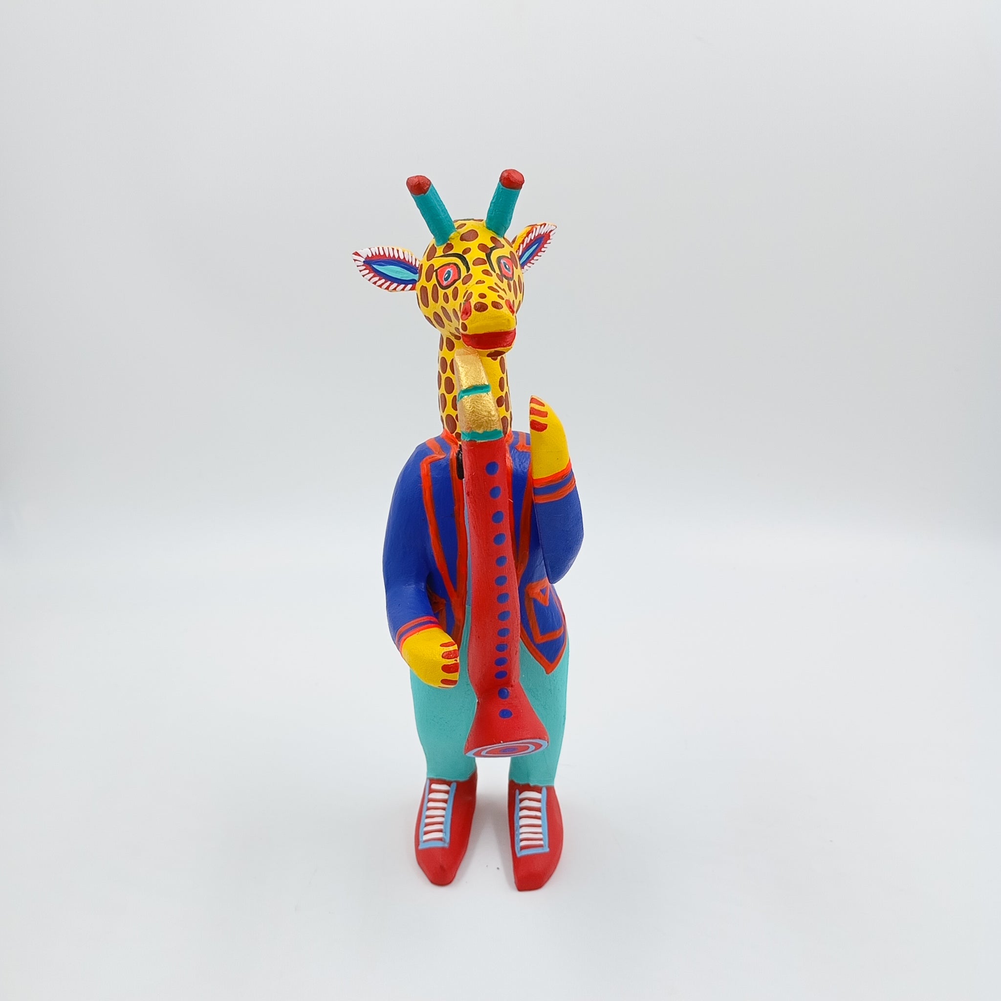 Alebrije jirafa con saxofón - San Martín Tilcajete