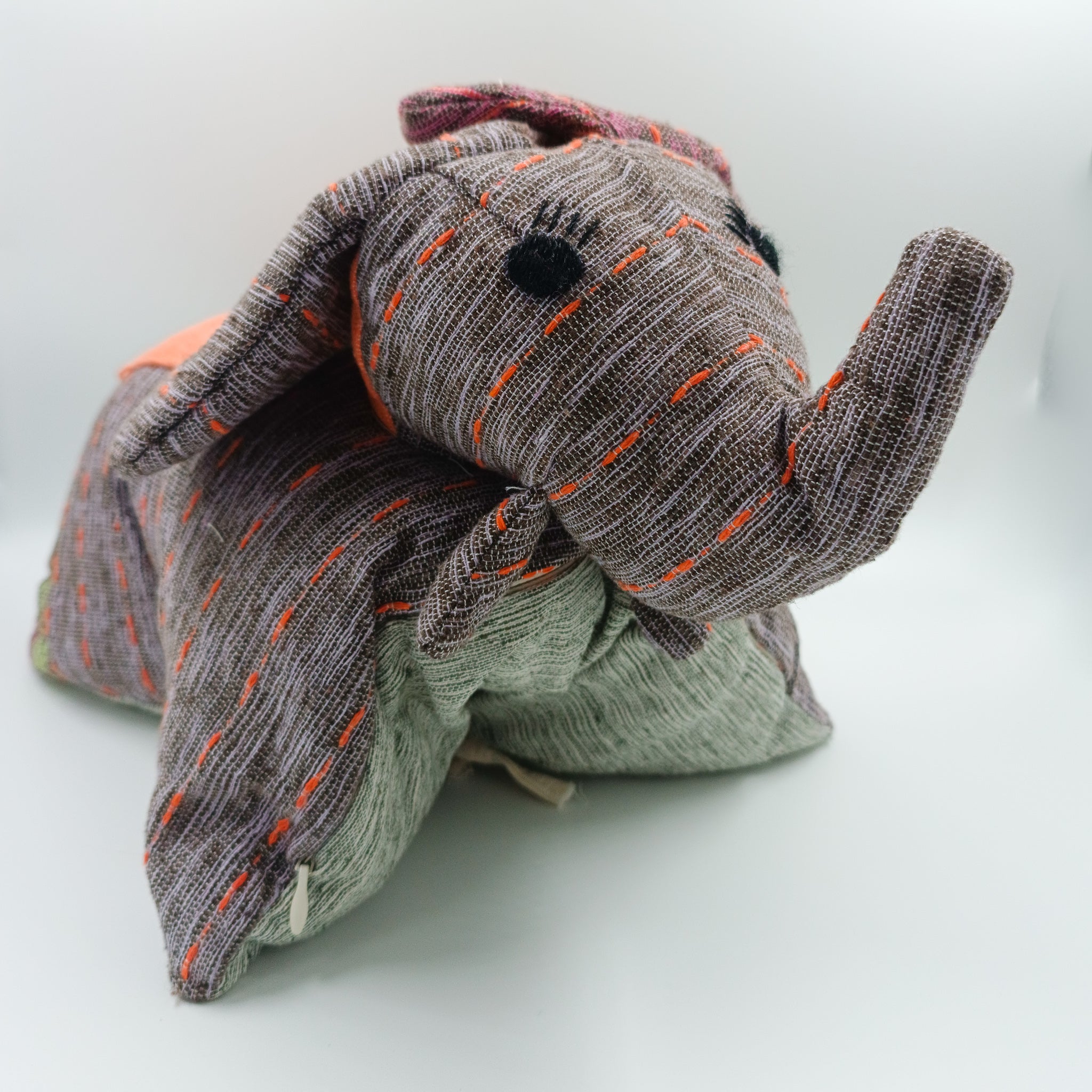 Stuffed animals convertible into cushions - made with backstrap loom