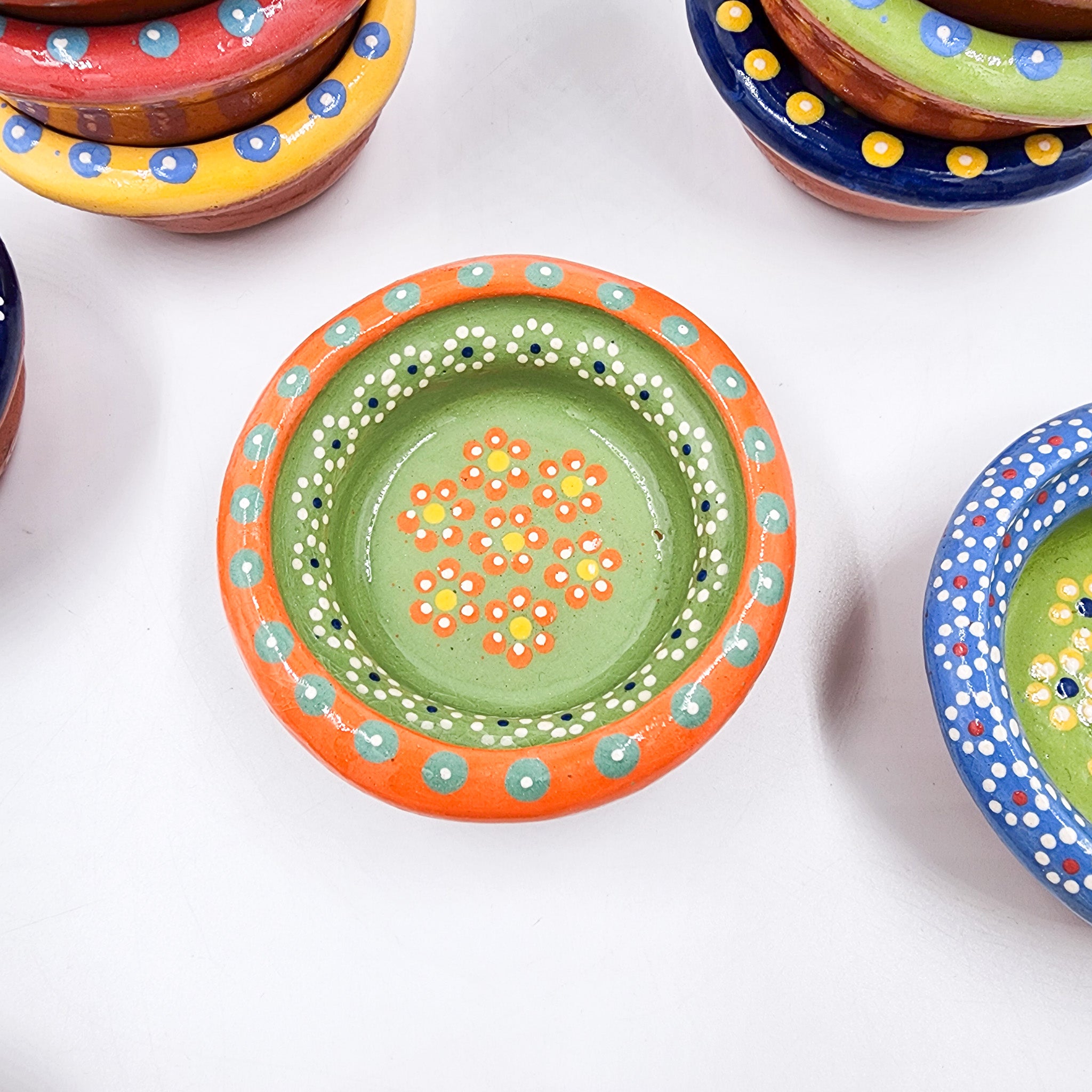 Small hand-painted clay plate