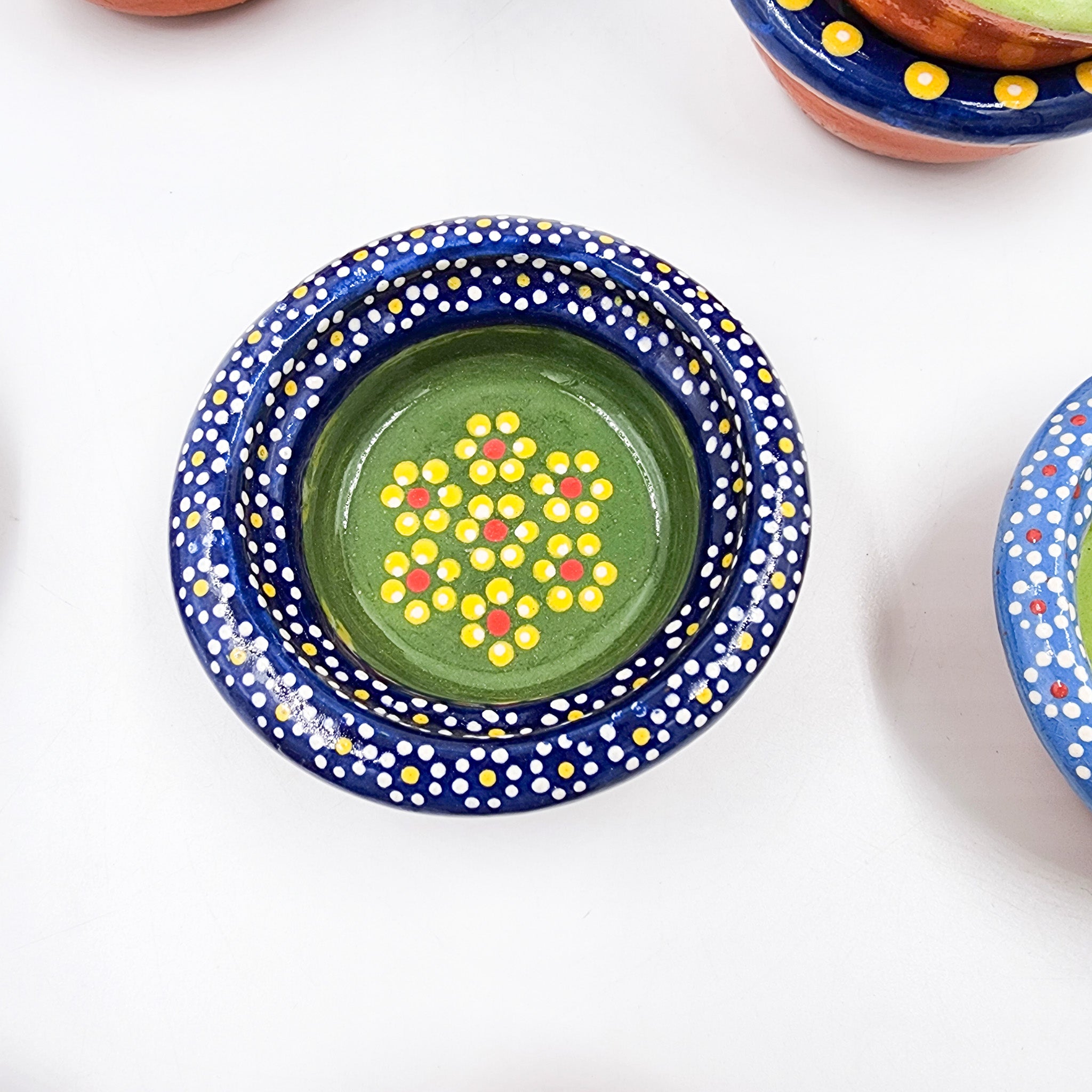 Small hand-painted clay plate