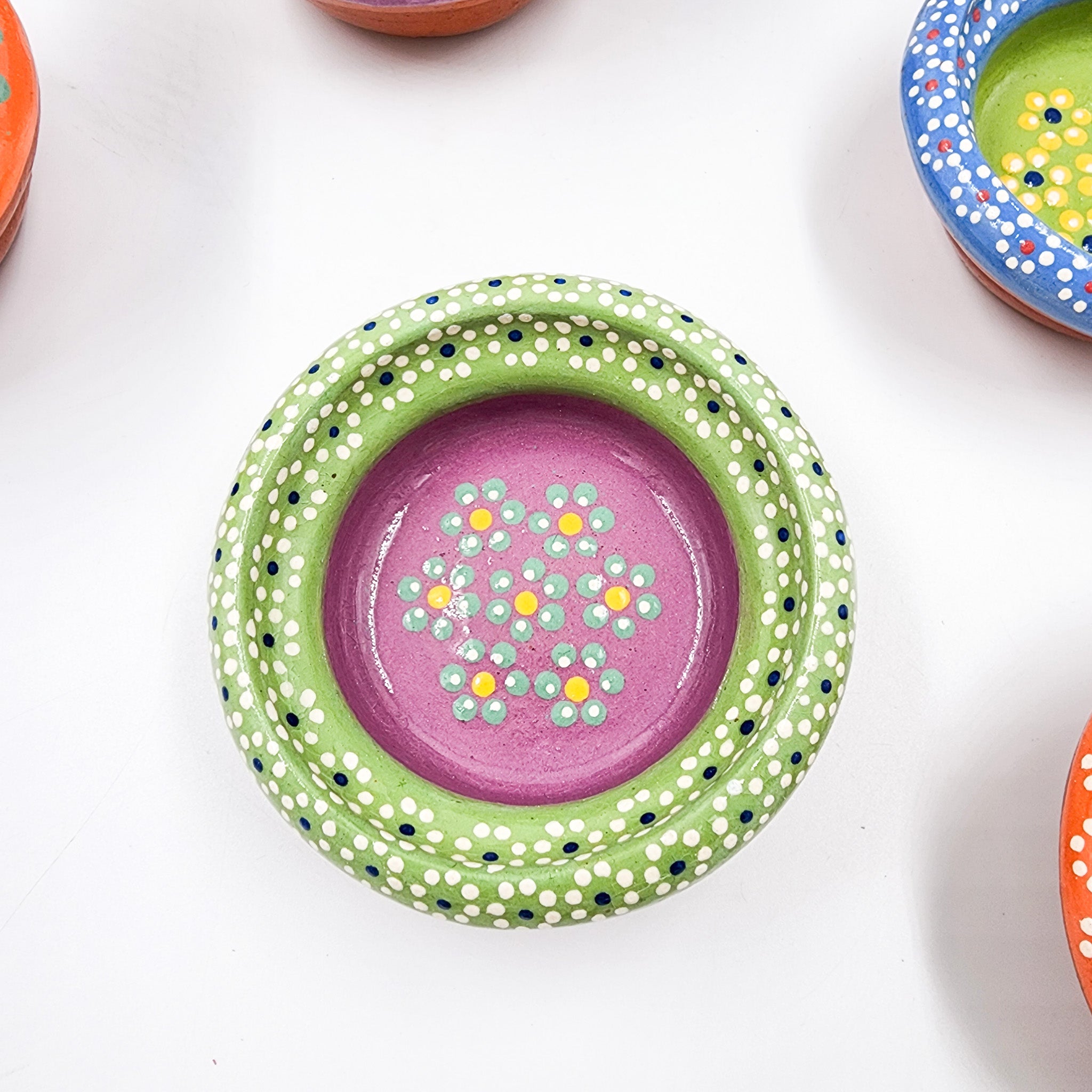 Small hand-painted clay plate