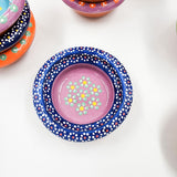 Small hand-painted clay plate