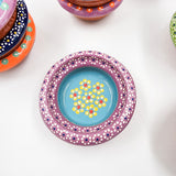 Small hand-painted clay plate