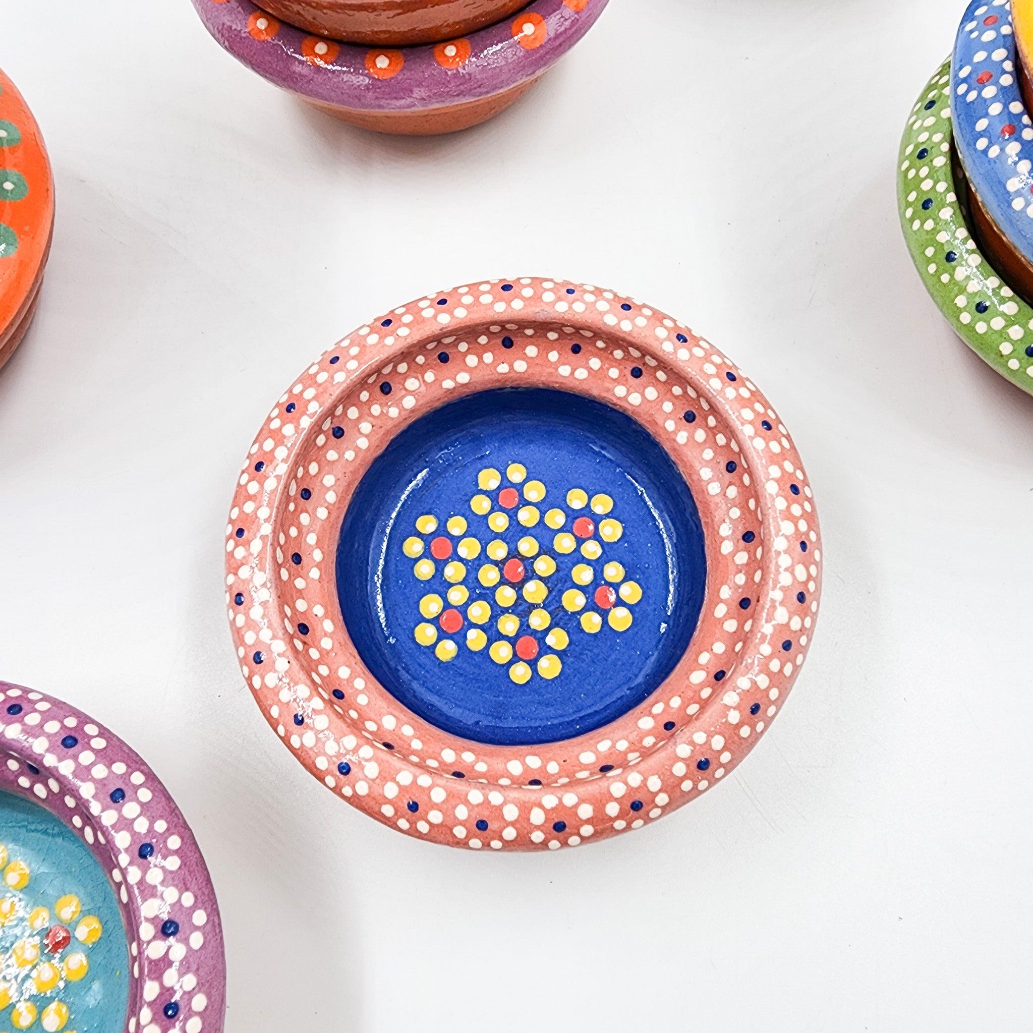 Small hand-painted clay plate