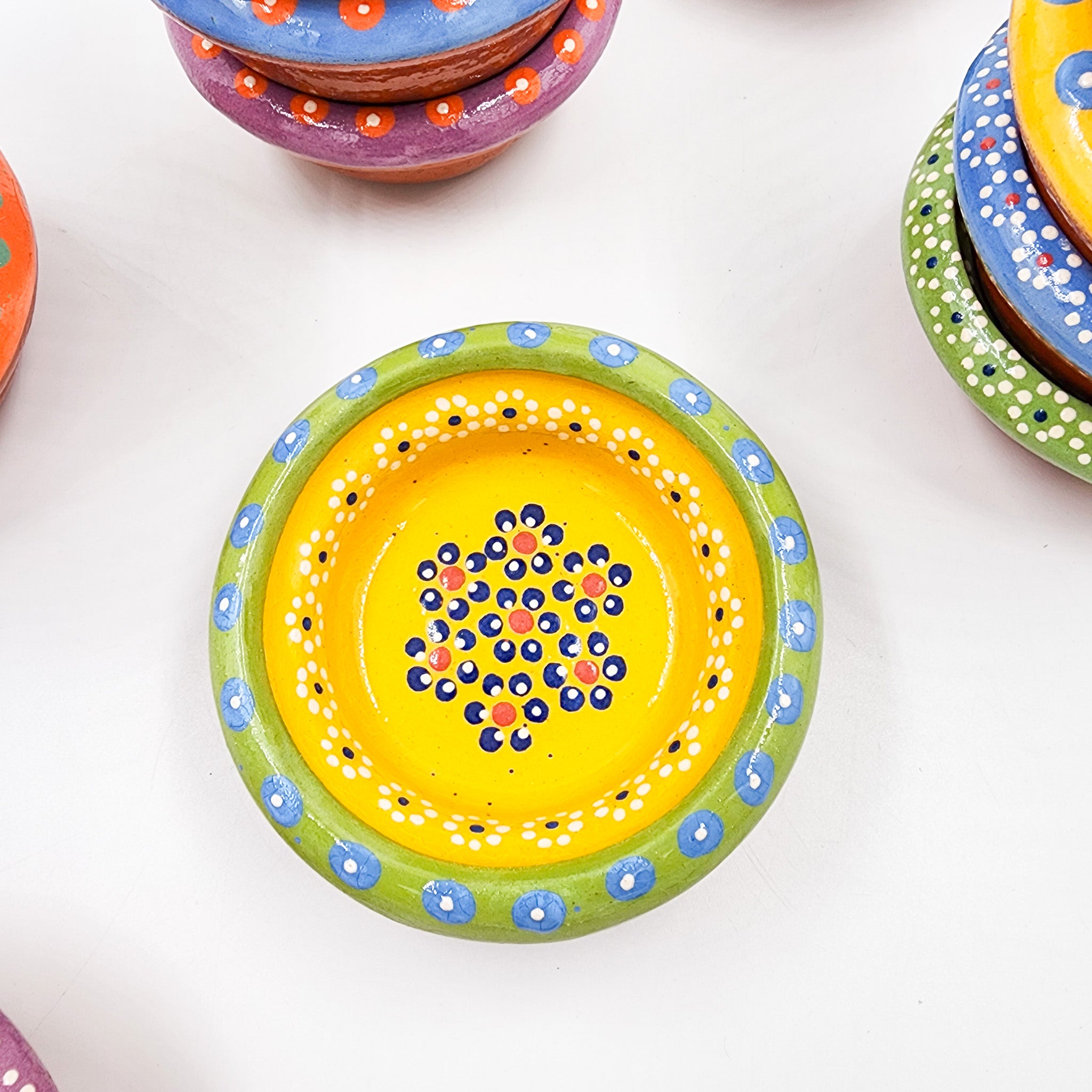 Small hand-painted clay plate