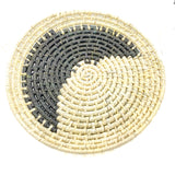 Handwoven plates in palm with half moon