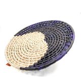 Handwoven plates in palm with half moon