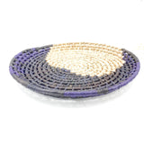 Handwoven plates in palm with half moon