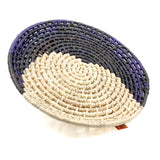 Handwoven plates in palm with half moon