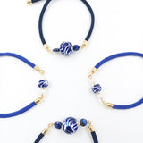 Pulsera de talavera con cordón de nylon ajustable
