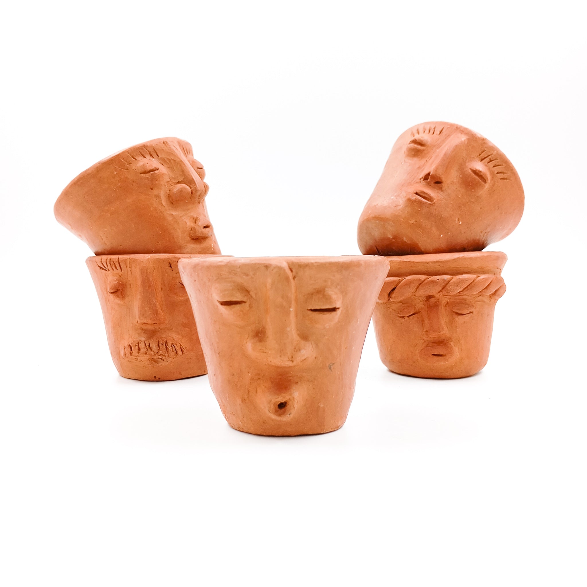 Vasito tequilero con carita de barro de Oaxaca