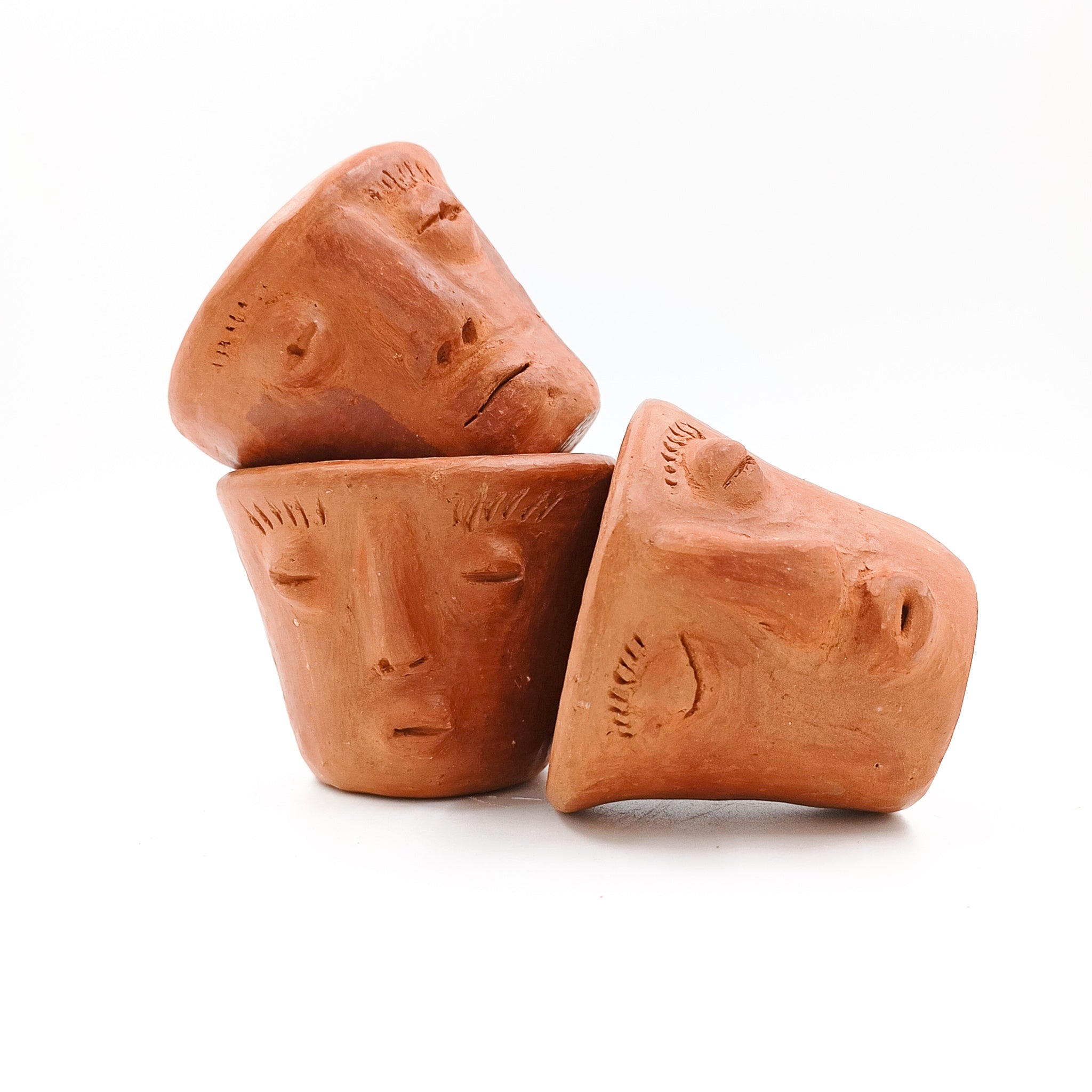 Vasito tequilero con carita de barro de Oaxaca