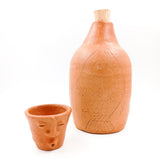 Vasito tequilero con carita de barro de Oaxaca