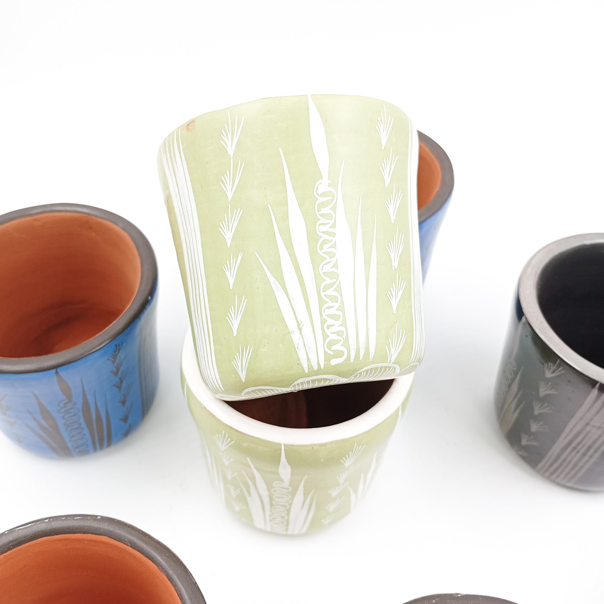 Set de dos vasos cocteleros en barro bruñido