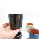 Set de dos vasos cocteleros en barro bruñido