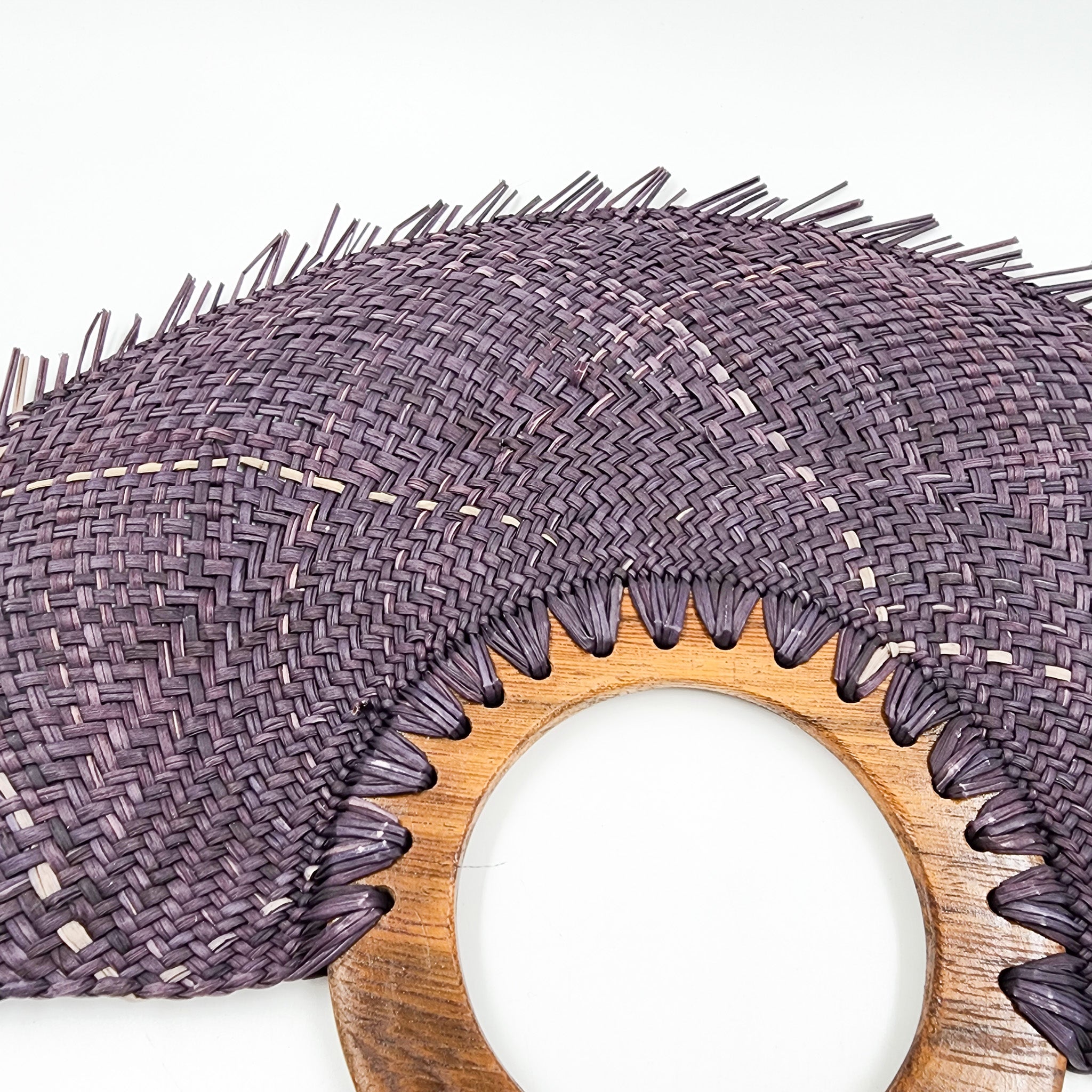 Large purple jipijapa fan with wooden handle