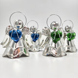 Angelitos de hojalata con corazón de vidrio soplado