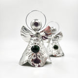 Angelitos de hojalata con canica de vidrio