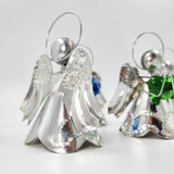 Angelitos de hojalata con corazón de vidrio soplado