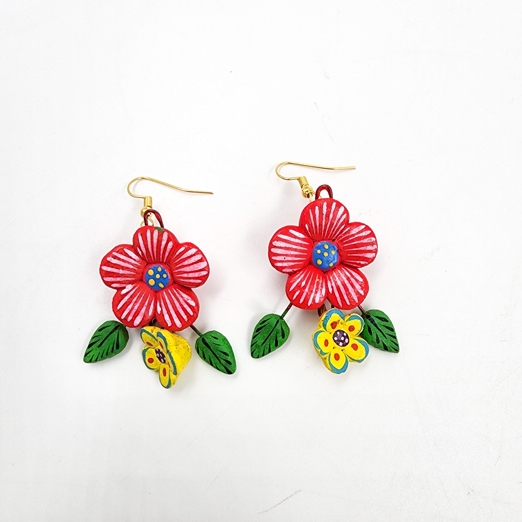 Aretes de flores en barro betus artesanal