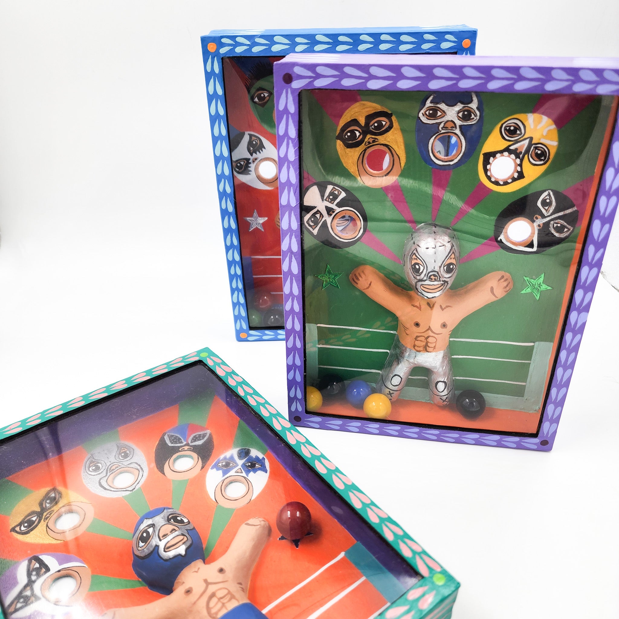 Juego de canicas Luchadores – cartonería mexicana artesanal