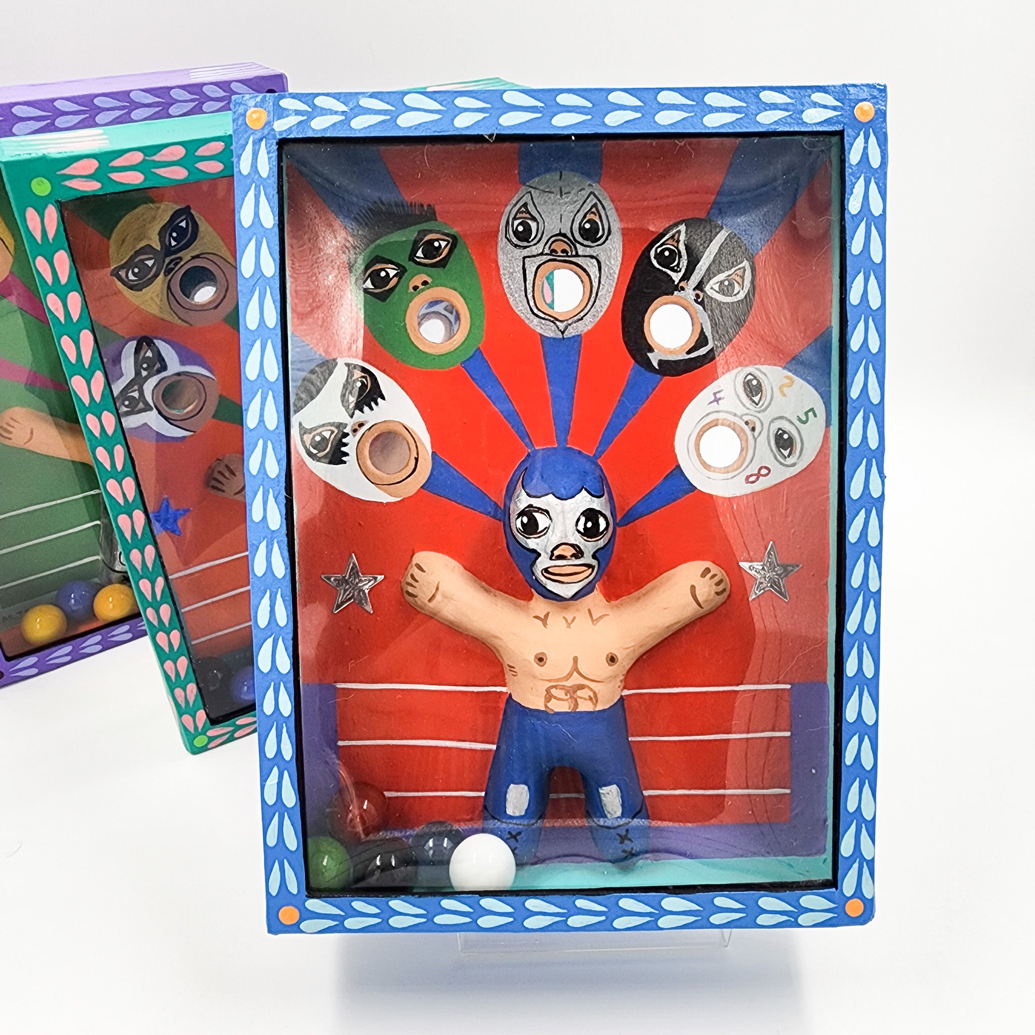 Juego de canicas Luchadores – cartonería mexicana artesanal