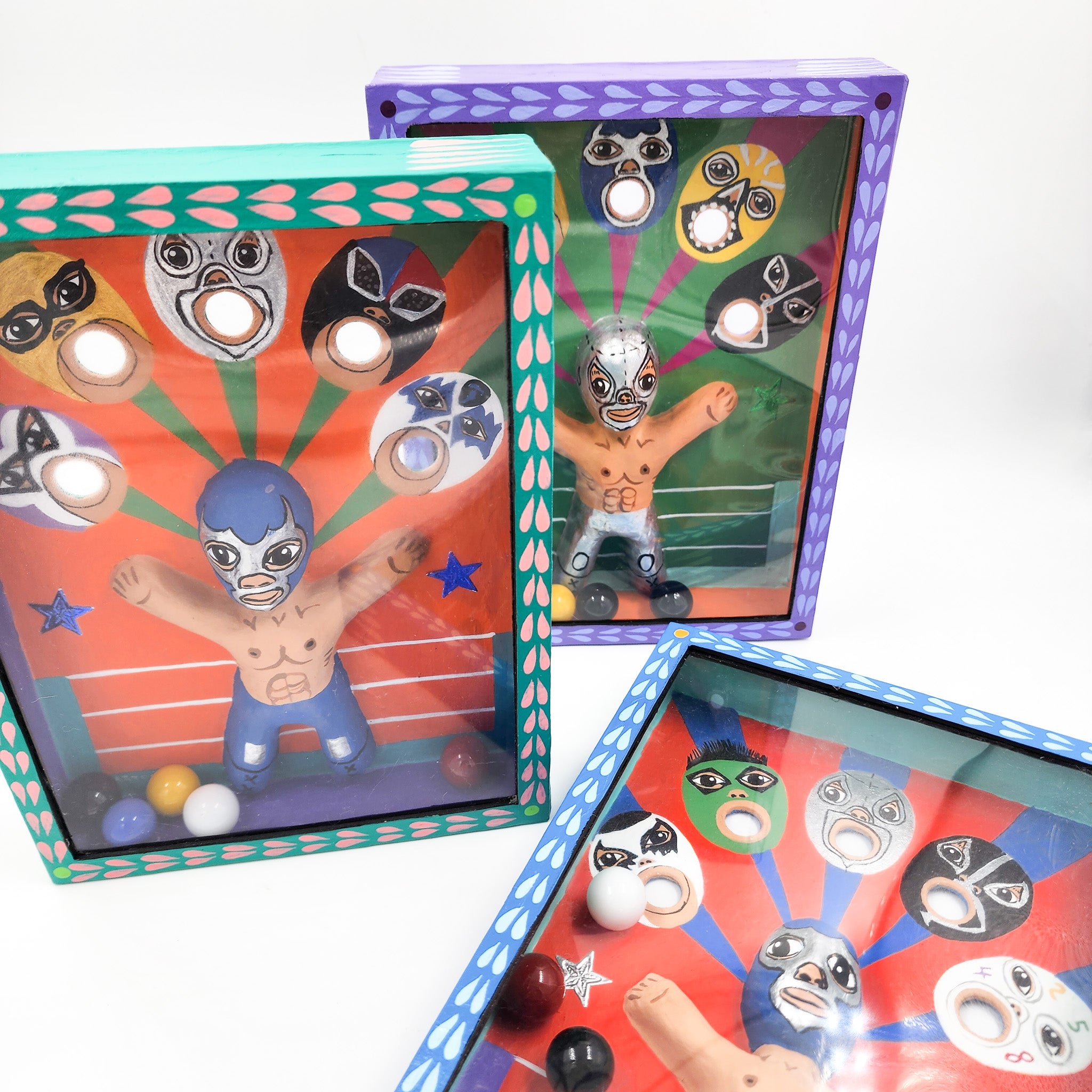 Juego de canicas Luchadores – cartonería mexicana artesanal