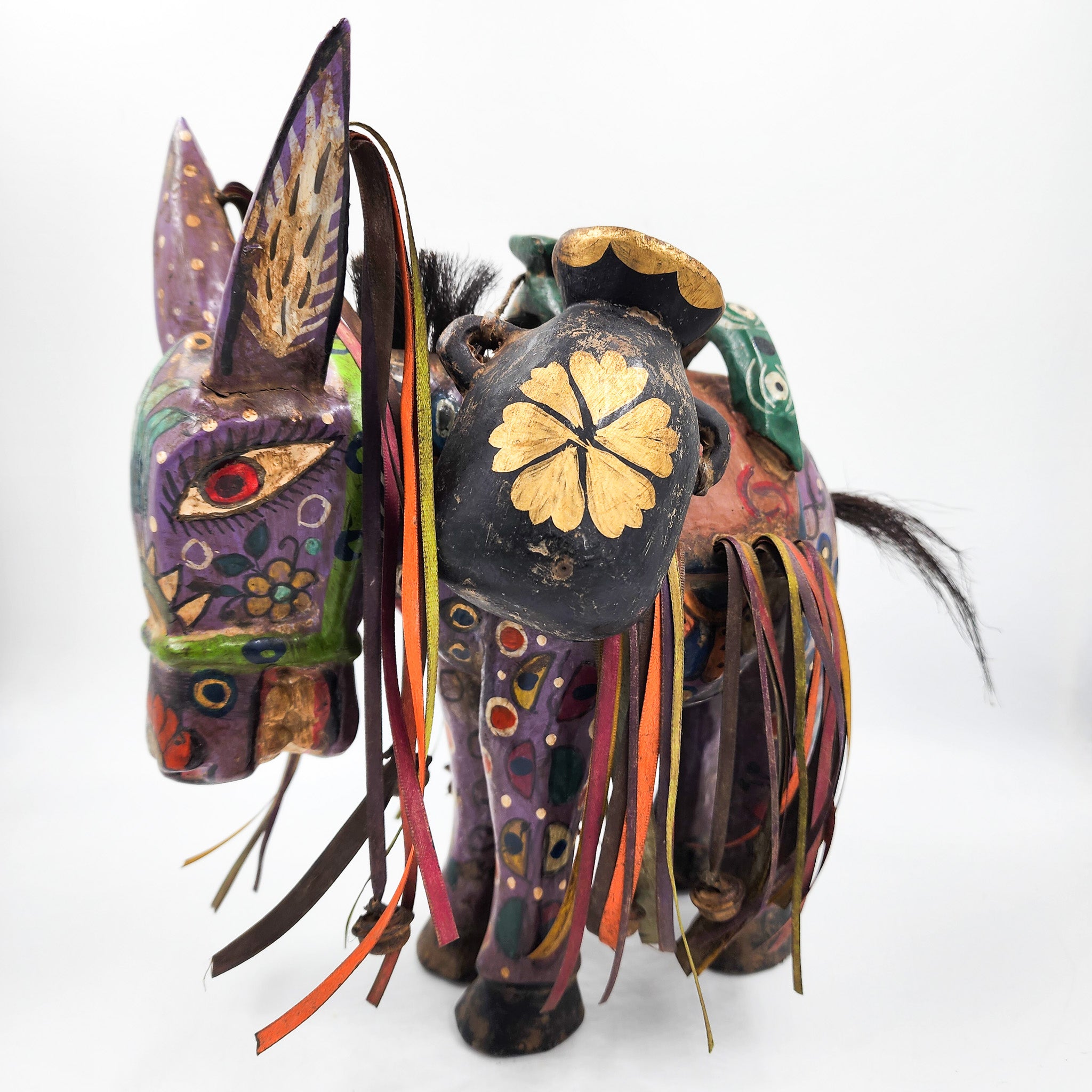 Hand-carved and hand-painted wooden donkey